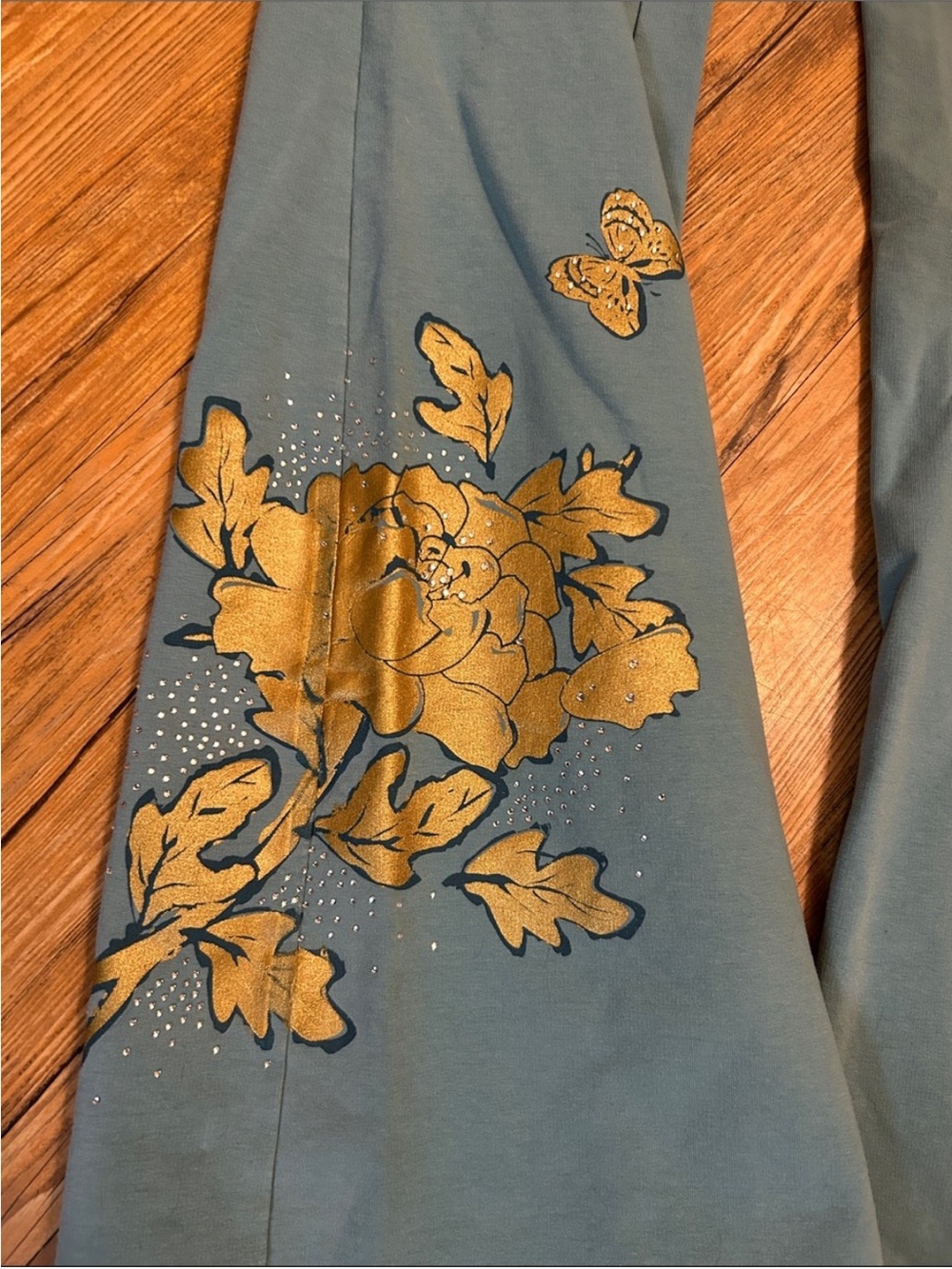BCBGMaxAzria Teal Flared Leggings with Gold Floral Detail - Picture 5 of 6